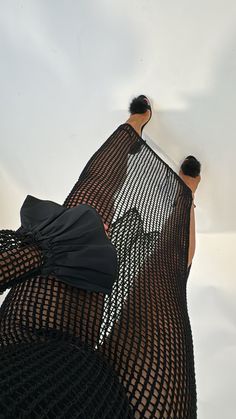 Unleash your inner fashionista with the Cameron Mesh Midi Dress! This stunning fish net dress features a unique ruffle cuff detail and can be styled in a variety of ways - from a flirty date night look with a body suit and heels, to a chic swim cover up on your next vacation. Versatile, stylish, and oh-so-unique - it's a must-have in your wardrobe (or suitcase)! Kelsey is wearing a size M/L Fish Net Dress, Suit And Heels, Fishnet Dress, Mesh Midi Dress, Net Dress, Fish Net, Cuff Detail, Swim Cover, Night Looks