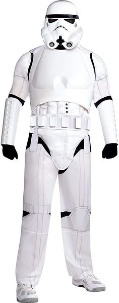 a man in a stormtrooper costume is standing with his hands on his hips