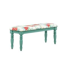 an upholstered bench with floral fabric on top and legs, against a white background