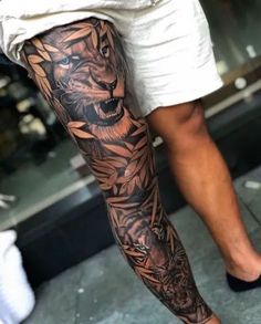 a man with a tattoo on his leg