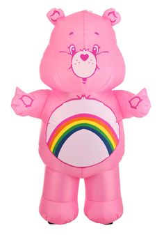 an inflatable pink bear holding a rainbow