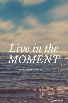 an ocean with the words live in the moment and enjoy every bit written on it