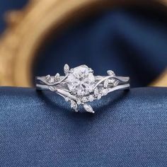 a white gold engagement ring with diamonds on it