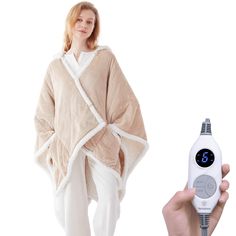 PRICES MAY VARY. WEARABLE HEATED PONCHO THROW - Westinghouse wearable heated blanket 50" x 60" keeps you warm and cozy. 7”*9” Deep Pockets in front of the wearable blanket, keep your hands warm, can place your phone, snacks, remote control or else you want, anytime, anywhere ETL AND FCC CERTIFIED - 6 Heating levels for different people needs. 2-10 Hours time setting, overheat protection ensure your safety during normal use. Please read the instructions carefully before use to avoid local overhea Shawl With Pockets, Heated Throw, Beige Home, Throw Blanket Size, Snuggle Blanket, Poncho Shawl, Plaid Throw, Heated Blanket, People Clothes