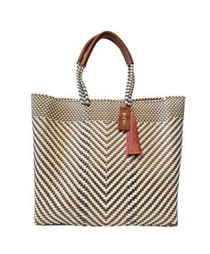 Maximize your style with the Hannah Tote Bag - Ivory Luxe! Handcrafted from recycled plastic bottles and featuring durable leather straps, this elegant bag is perfect for any outfit. Experience the long-lasting quality of this timeless accessory as you conquer your day and slay your look. Fits a laptop and comes lined for added convenience.! Details & Dimensions Lined Durable leather top handles One interior zipper pocket Two interior side pockets Fits a 16" laptop Magnetic closure 15" W (38cm) Luxury Tote Bags, Sustainable Bag, Crafts From Recycled Materials, Straw Tote Bag, Elegant Bags, Designer Totes, Convertible Bags, Straw Tote, Timeless Accessories