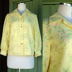 Super Cute Blouse Circa 1960s/1970s Yellow with Green & Pink Delicate Mod Flower Design Wide Pointed Collar Darting at Chest Button Up Front Long Sleeves Button at Each Cuff **previous owner has added yellow stretch material at each cuff to allow stretch. Can easily be removed. Please see all photos - sold as is NO TAGS Tag size may not be accurate to current day sizing, please refer to garment's measurements. Garments are measured laying flat - measurements doubled as necessary. Chest: 40 in Bottom Hem: 37 in Length: 22 in All sales are final. Our items are Vintage, meaning they have been around 20+ years. Due to the passage of time, and previous wear, they may have some resulting flaws or imperfections. Please read store policies and item description before purchase. If you have question Retro Spring Blouse With Button Closure, 1970s Vintage Fashion Tops For Spring, Retro Spring Blouse With Buttons, 1970s Style Retro Print Blouse For Spring, Spring Blouse With Vintage Pattern, Retro Tops With Vintage Pattern For Spring, Green Floral Print, Cute Blouses, Yellow Blouse