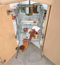 an open pantry door with spices and condiments