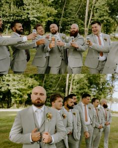 a group of men standing next to each other in front of trees and one man wearing a suit