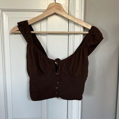 Super Cute Brown Top From Pacsun! Never Worn Size Xs Brown Sleeveless Crop Top For Vacation, Sleeveless Brown Crop Top For Vacation, Brown Summer Crop Top For Vacation, Brown Crop Top For Vacation In Spring, Brown Crop Top For Spring Vacation, Brown Crop Top For Summer Day Out, Casual Brown Crop Top For Beach, Summer Brown Crop Top For Vacation, Chic Brown Crop Top For Vacation