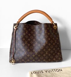 It’s #MonogramMonday with this Louis Vuitton Artsy MM, which includes its original dust bag! Luxury Bucket Bag Tote With Gold-tone Hardware, High-end Brown Leather Bucket Bag, Luxury Gold-tone Hardware Hobo Tote Bag, Louis Vuitton Artsy Mm, Louis Vuitton Speedy 25 Damier Ebene, Louis Vuitton Flower Mm Monogram Canvas & Cowhide Leather Zipped Tote Noir