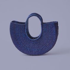 The Anyo Half Moon bag is a colorful, playful style that will compliment any outfit. Designed with an elegant silhouette that provides ample space for your daily essentials. 15" W x 10" H (8.5" handle drop) Available in hand-dyed blue or natural Made from 100% elephant grass Due to it's handmade nature, some size and color variation may occur. Behind The Design: Ghana has a rich cultural tradition of craftmanship known for many celebrated artisan techniques. The art of bolga weaving originated i Business Skills, Stained Glass Suncatchers, Swim Shop, Sunglasses Shop, Half Moon, Ghana, Body Skin Care, Accessories Shop, Hand Dyeing