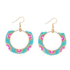 Treat your ears to something special with Laurel! These handmade beauties feature a vibrant teal beaded gold circle with fuschia accents, a combo sure to bring a smile to your face. Perfect for making a statement, they’ll be sure to bring out the best in you - and your outfit! Turquoise Beaded Earrings For Beach, Pink Hoop Beaded Earrings For Festival, Trendy Pink Round Beaded Earrings, Bohemian Pink Circular Jewelry, Bohemian Pink Circle Jewelry, Beaded Pink Hoop Earrings For Beach, Pink Beaded Hoop Earrings For Beach, Vibrant Pink Jewelry For Festivals, Pink Jewelry With Gold Beads For Festival