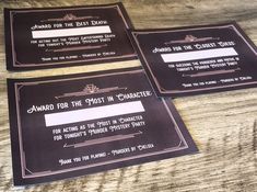 three black and white wedding cards on top of a wooden table with the words award for the most in character