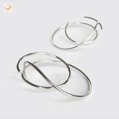 Edith Toledano | Sterling Silver Large Thick Hoop Studs, Gauged Hoops for 18g Piercings, Spiral Wire Earrings, Sculptural Statement Hoop Earrings, Ear Jackets | #SterlingSilverHoops #SterlingSilverHoopStuds #SterlingSilverHoopEarrings #HoopEarrings #HoopStuds #LargeHoops #ThickHoops #GaugedHoops #18GaugePiercings #SpiralEarrings #WireEarrings #SculpturalEarrings  #StatementEarrings #EarJackets #EdithToledano #Etsy Nickel-free Metal Open Circle Earrings, Nickel-free Spiral Metal Hoop Earrings, Artistic Nickel-free Metal Hoop Earrings, Adjustable Cadmium-free Sterling Silver Hoop Earrings, Nickel-free Adjustable Silver-plated Hoop Earrings, Silversmithing Jewelry