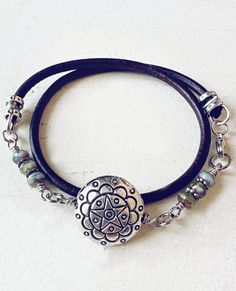 Back in Stock! Layer, drape, or wrap up this mandala star coin bead leather bracelet for a pretty layered looking style! With a myriad of ways to wear it, you'll seemingly have a new accessory every time you step out. Stack it with other bracelets or let it shine solo - either on your wrist, neck, or ankle and embrace your unique boho vibes. Bohemian Style Adjustable Bracelet For Layering, Silver Bohemian Wrap Bracelet Nickel Free, Bohemian Wrap Bracelet For Layering, Everyday Bohemian Nickel Free Wrap Bracelet, Nickel Free Silver Bohemian Wrap Bracelet, Silver Bohemian Leather Bracelet, Hand Wrapped Silver Bohemian Leather Bracelet, Bohemian Silver Wrap Bracelet, Nickel Free, Bohemian Nickel-free Silver Wrap Bracelet