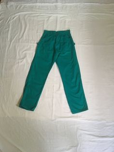 "vintage painter pants Gap, made in USA cotton green color dyed SCOVILL zipper 6 pockets w/hammer loop good vintage condition, light wear, light pilling, tiny thread nib on thigh measures, lying flat, waist-14\" rise-12\" inseam-31\" hem-7\" outseam-41\" hip-20\"     We do not offer returns or refunds unless something is grossly misrepresented. Please contact us within 2 business days of receiving to discuss any possible returns for this reason. We do not offer refunds for your shipping fees. Please feel free to contact us with any questions you may have about an item prior to purchase and we will gladly answer them." Green Relaxed Fit Work Pants With Cargo Pockets, Green Utility Cotton Work Pants, Green Relaxed Fit Cotton Work Pants, Utility Green Straight Leg Work Pants, Green Relaxed Fit Work Pants With Pockets, Green Utility Cargo Jeans With Relaxed Fit, Green Utility Work Pants Straight Leg, Green Cotton Jeans With Cargo Pockets, Green Relaxed Fit Utility Work Pants