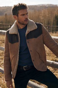 Inspired by ranch living, our Mustang curly sheepskin jacket has all the hallmarks of fine western tailoring. Contrasting lambskin leather yoke, scalloped pockets, and cutaway front add to the authenticity of this jacket, making it a trusted companion that will always keep you warm, whether you happen to be on horseback or walking along a country trail. Ranch Living, Sheepskin Jacket, Sheepskin Coat, Suede Fashion, Dope Fashion, Casual Stylish, Warm Coat, Shearling Jacket, Button Design