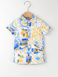 Bring a touch of tropical paradise to your little one's wardrobe with our 2 Pc Baby Boy Lemon Print Resort Shirt and Shorts Set! Crafted with summery vibes in mind, this ensemble features a charming lemon print resort shirt paired with coordinating shorts for a fun and stylish look. Made from soft and breathable fabric, it ensures comfort and ease for your little explorer during warm-weather adventures. Whether it's a beach day or a family vacation, this set is perfect for keeping him cool and f Yellow Beachwear Sets For Summer, Playful Yellow Tops For Vacation, Summer Vacation Tops With Lemon Print, Summer Tops With Lemon Print For Vacation, Summer Lemon Print Tops For Vacation, Yellow Summer Sets For Beach Season, Yellow Short Sleeve Summer Sets, Playful Yellow Sets For Vacation, Yellow Summer Sets With Short Sleeve