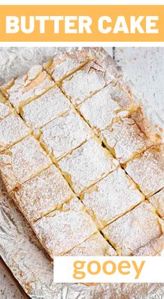 a close up of a cake on a pan with the words gooey written below it