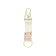 a white and beige strap with a hook on it