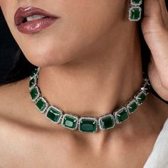 This Manish Malhotra Jewelry Inspired Emerald Choker Necklace. This emerald necklace also matches a lot of pieces from Harry Winston. Enhance your neckline with a stunning Emerald Green Necklace that exudes elegance and allure. Alternatively, for a touch of opulence, choose a Green Diamond Necklace. Add a dazzling sparkle to your look with CZ or cubic zircon embellishments. Embody the allure of emerald and green hues to elevate your style and leave a lasting impression. *𝐏𝐑𝐎𝐃𝐔𝐂𝐓 𝐃𝐄𝐓𝐀𝐈𝐋* * Material: Brass * Plating: White Rhodium Plated * Stone: AAA-quality CZ diamond & Emerald. *𝐃𝐈𝐌𝐄𝐍𝐒𝐈𝐎𝐍𝐒*  Necklace * Weight: 41 gm * Design Length: 9.6  inches * Total Length with Closure: 16.6 inches * Width: 0.7 Inches  Earrings * Weight: 7 gm each * Length: 1.6 Inches * Width:  0. Luxury Green Choker For Festive Occasions, Necklace For Saree, Emerald Green Jewelry Set, Green Diamond Necklace, Emerald Jewelry Necklace, Emerald Jewelry Set, Green Emerald Necklace, Emerald Choker, Emerald Diamond Necklace