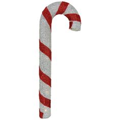 a red and white candy cane with glitter on it's side, in front of a white background