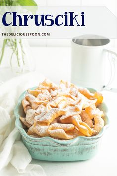 a bowl filled with powdered sugar on top of a table