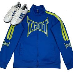 Tapout Full Zip Athletic Track Jacket Blue Spell Out Sweatshirt Y2K Boxing Sportswear. Men’s Size Medium. Blue/Neon Green with a large spellout logo across the chest and a smaller one on each arm. Has stripes up each arm and the word ‘Believe’ on the right arm. Great condition! Awesome jacket in trendy neon colors. Not many of these listed! I only found one. Measurements: Pit to pit: 21 inches Length: 27.5 inches SELLER INFO/POLICIES: Hello! 😁 Welcome. My name is Alex and I take pride in my cus Blue Long Sleeve Outerwear With Logo Print, Casual Blue Outerwear With Logo Print, Blue Throwback Long Sleeve Track Jacket, Throwback Blue Long Sleeve Track Jacket, Blue Crew Neck Track Jacket For Streetwear, Crew Neck Outerwear With Three Stripes For Streetwear, Sportswear Men, Sweatshirt Y2k, Gym Jacket