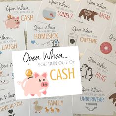 a pile of cards that say open when you run out of cash and have piggies on them