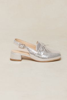 Slip into style with our Mini Ivy Bow Loafers in stunning silver. The square, closed toe design offers a sleek look, while the adjustable buckle at the side ankle ensures a secure fit. Perfect for adding a touch of whimsy to any outfit this holiday season. Fairytale Party, White Dress Party, Boys Romper, Shoe Gifts, Fall Kids, Everyday Dresses, Girls Rompers, Kids Jewelry, Toe Designs