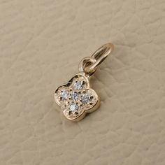 Solid 14k Yellow Gold Charm Pendant Pave Diamond Minimalist Jewelry Gift For Her PEMJ-1819 Gross Wt : 0.49gm 14k Gold Wt : 0.47gm Diamond Wt : 0.1ct Pendant Size : 5 MM You can contact me if you have any query about anything.  Have a FINE ADORNMENT!!  ✦ This is the perfect gift for mom, wife, fiancée, girlfriend, valentine, daughter, family or friend. It is a special gift for mother's day, valentine's day, wedding, anniversary, birthday, Christmas, Easter, New Year's and any holiday. ✦ Custom Orders : Since most products are handmade and made by members of my shop , you can ask us any kind of customization. You can choose from 14k Gold, 925 Silver And Diamond. For most of the items. Gemstone can be changed as per your preferences. ✦Thank You for visiting our shop. ❤ 14k Gold Flower Pendant Jewelry With Birthstone, Everyday Yellow Gold Jewelry With Flower Charm, Delicate Yellow Gold Charms Jewelry, Delicate Yellow Gold Jewelry With Charms, 14k Yellow Gold Filled Jewelry With Flower Charm, 14k Gold Filled Yellow Gold Flower Pendant Jewelry, 14k Gold-filled Yellow Gold Flower Pendant Jewelry, 14k Yellow Gold Jewelry With Flower Charm, 14k Rose Gold Jewelry With Flower Charm