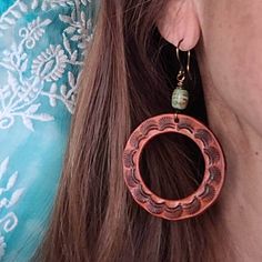 These hoop style earrings feature a hand stamped southwestern design, are dyed medium tan and topped with genuine Elisa mine turquoise beads...earrings hang from hand formed bronze French style ear wires... Do you have sensitive ears?  I offer titanium ear wires and am happy to replace them on these earrings.  Simply add the listing below to your order:  https://www.etsy.com/listing/1461783353/titanium-ear-wires-hypoallergenic-ear?click_key=d2deb59f130b3505244212b93ed2f86aac9751ee%3A1461783353&c Cowgirl Turquoise, Western Bride, Turquoise Bead Earrings, Jewelry Western, Earrings Western, Leather Earring, Southwestern Design, Earring Designs, Bride Earrings