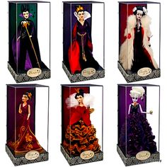 six disney dolls are in the same case as each other, one is wearing a gown