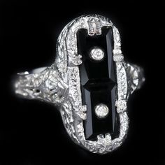 an art deco diamond and black onyxite ring