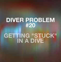 a blurry photo with the words, diver problem 20 getting stuck in a dive