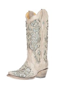 a women's cowboy boot with silver sequins