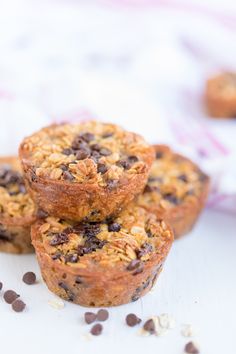 baked oatmeal chocolate chip breakfast cups stacked on top of each other