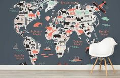 the world map with animals and ships painted on it's wall in a children's room