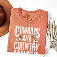 Show off your love for the wild west with our Cowboys and Country Music T-shirt! Featuring a classic Western design, this Comfort Colors shirt is perfect for rodeo lovers, festival goers, and anyone who adores country music. Whether you're rocking your favorite cowgirl boots or looking for a standout festival shirt, this tee makes a great country music gift. Made for comfort and style, it's an ideal choice for all the country music fans and western fashionistas out there! 🌟 HOW TO ORDER 🌟 Peek Graphic Print Cotton Tops For Country Concerts, Letter Print T-shirt For Country Concerts In Fall, Fall T-shirt With Letter Print For Country Concerts, Western Style Cotton Tops With Screen Print, Western Cotton Tops With Graphic Print, Graphic Tee With Text Print For Country Concerts, Country Style T-shirt For Rodeo In Spring, Western Style Cotton T-shirt For Country Concerts, Cotton Band Merch T-shirt For Country Concerts