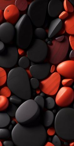 an image of rocks and pebbles in red and black