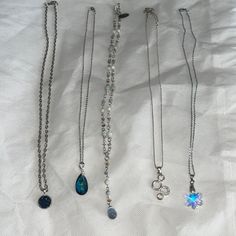 All In Great Condition, Two Necklaces (First And Fourth) In Need Of A Little Polishing, But Not Visible When Wearing. Snowflake Crystal Necklace And Blue Pendant Crystal Necklace Never Worn! All Clasps Work. Comment Below If You Would Like To Purchase Anything Separately, I Can Create A New Listing For You! Locket Necklace Aesthetic, Two Necklaces, Xmas Wishes, Blue Pendant, Bracelet Ideas, Aesthetic Outfit, Locket Necklace, Long Necklace, Crystal Necklace