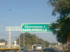 a street sign that reads benvenndos a barranquilla on it