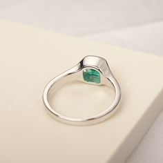 All HANDMADE ITEMS SHIP IN APPROX 8 DAYS Main Stone: Lab created emerald Main Stone Size: cushion cut 6 mm x 6 mm Main Stone Weight: 0.98 carat Side Stone: None Height From The Ring Setting Bottom(to gemstone top): about 4.43 mm Width of Ring band Measure: gradually varied,about 2.28 to 2.3 mm Material: 925 Sterling Silver/14K White Gold/14K Yellow Gold/14k Rose Gold Engraved: Available For FreeNo more than 13 letters) Customized:Of course! Tell me what you want Includes With Order: All of my st Silver Emerald Ring With Cushion Cut, Minimalist Emerald Cut Birthstone Ring With Bezel Setting, White Gold Emerald Ring With Bezel Setting As Gift, Silver Cushion Cut Ring With May Birthstone, Silver Cushion Cut Ring For May Birthstone, Minimalist Emerald Ring With Bezel Setting For Anniversary, Silver Princess Cut Emerald Ring For May Birthstone, Princess Cut Silver Emerald Ring For May Birthstone, Silver Emerald Ring With Bezel Setting For Promise