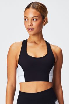 On-The-Go Medium Impact Sports Bra Fabletics Black/Classic White female Activewear >> Womens >> Sports Bras >> Sports Bra >> Medium Impact regular Training Moisture-Wicking/Removable Bra Cups Color Block Athleisure Sports Bra For Training, Athleisure Color Block Sports Bra For Training, Color Block Sports Bra Athleisure, Athleisure Color Block Sports Bra, Sporty Color Block Sports Bra For Training, Sporty Color Block Activewear For Gym, Sporty Color Block Sports Bra For Workout, Sporty Color Block Activewear For Training, Sporty Color Block Activewear For Workout