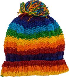 This is a cable round fleece-lined rainbow-colored pure wool hand-knit winter hat beanie with a multicolored rainbow pom at the top. One size fits most. #tlb #vacationclothing #Fall #Handmade #Skiing #Pride #Rainbow #RainbowWoolenHat #PrideWoolenHat #RainbowBeanie #RainbowAccessory Rainbow Beanie, Rainbow Accessories, Ski Trips, Woolen Hat, Wool Hat Knit, Bobble Hat, Hat Patterns, Wrap Around Skirt, Pride Rainbow