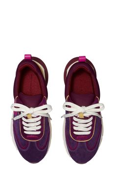 A logo embellishment and chunky sole make this lace-up sneaker a sporty and sophisticated fave. Lace-up style Removable insole Leather and textile upper and lining/rubber sole Imported Women's Shoes Tory Burch Good Luck Trainer, Trainer Sneakers, Up Styles, A Logo, Good Luck, Pink Purple, Womens Sneakers, Tory Burch, Women's Shoes