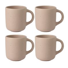 four coffee mugs sitting next to each other