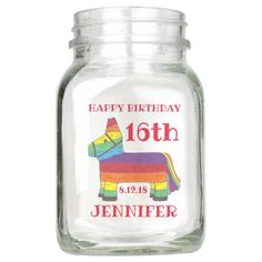 a glass jar with a rainbow horse on the front and happy birthday to jennyie