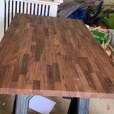 a large wooden table sitting in the middle of a room