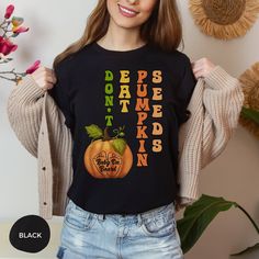 "Funny Pregnancy Announcement Shirt is a great way  to give your pregnancy announcement a funny and unique delivery with our \" Don't Eat Pumpkin Seeds\" shirt! This hilarious shirt is perfect for expecting moms who want to share their baby bump news in a humorous way. Made with high-quality material and featuring bold, eye-catching letters, this maternity shirt is sure to turn heads and get lots of laughs. Plus, the \"Don't Eat Pumpkin Seeds\" message is a fun and creative way to say I'm Pregna Pregnant Funny, Funny Maternity, Pregnant Shirt, Funny Pregnancy Announcement, Funny Pregnancy, Gifts For Expecting Parents, I'm Pregnant, Pregnancy Announcement Shirt, Maternity Shirt